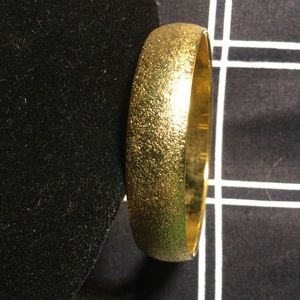Heavy Vintage gold-toned Monet bangle